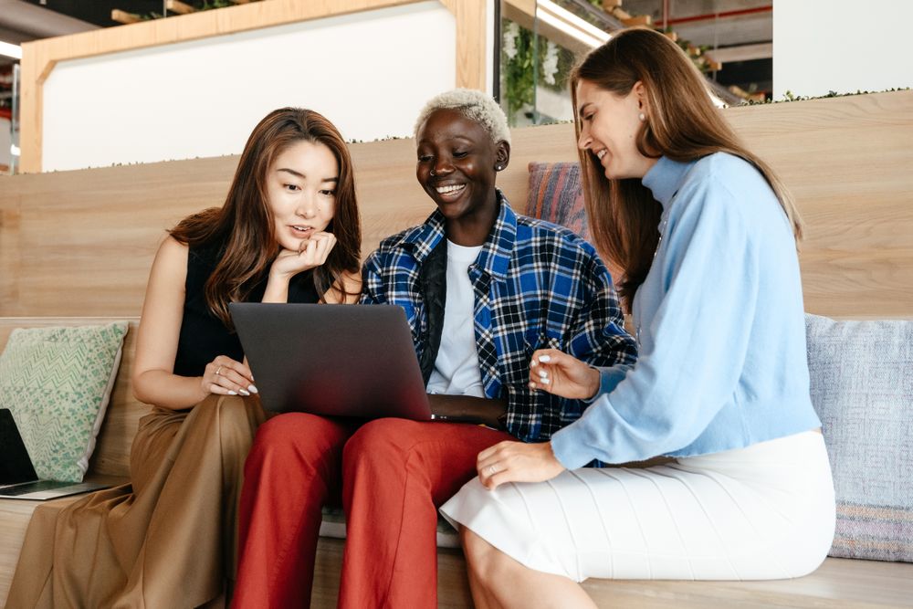 Customers signing up together on a laptop